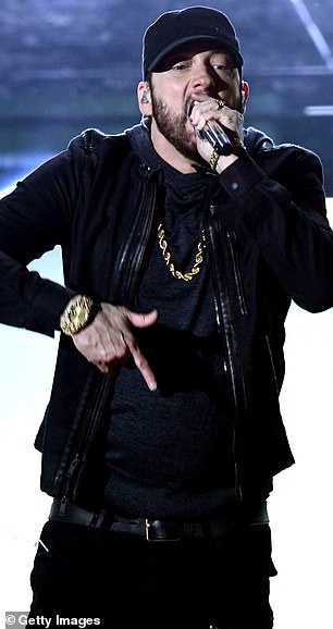 Parton has indicated that she does not want to take away votes from the other candidates, including Eminem (pictured) and Carly Simon