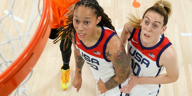 Brittney Griner and Breanna Stewart watch a shot during the 2021 WNBA All-Star Game on July 14, 2021, in Las Vegas, Nevada.