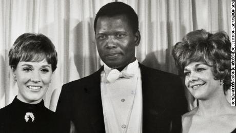 Julie Andrews, Sidney Poitier and Estelle Parsons at the 1968 Academy Awards. Poitier had attended Martin Luther King Jr.'s funeral the day before.