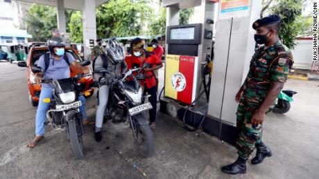 Soldiers were posted at gas stations to maintain peace as tensions escalated.