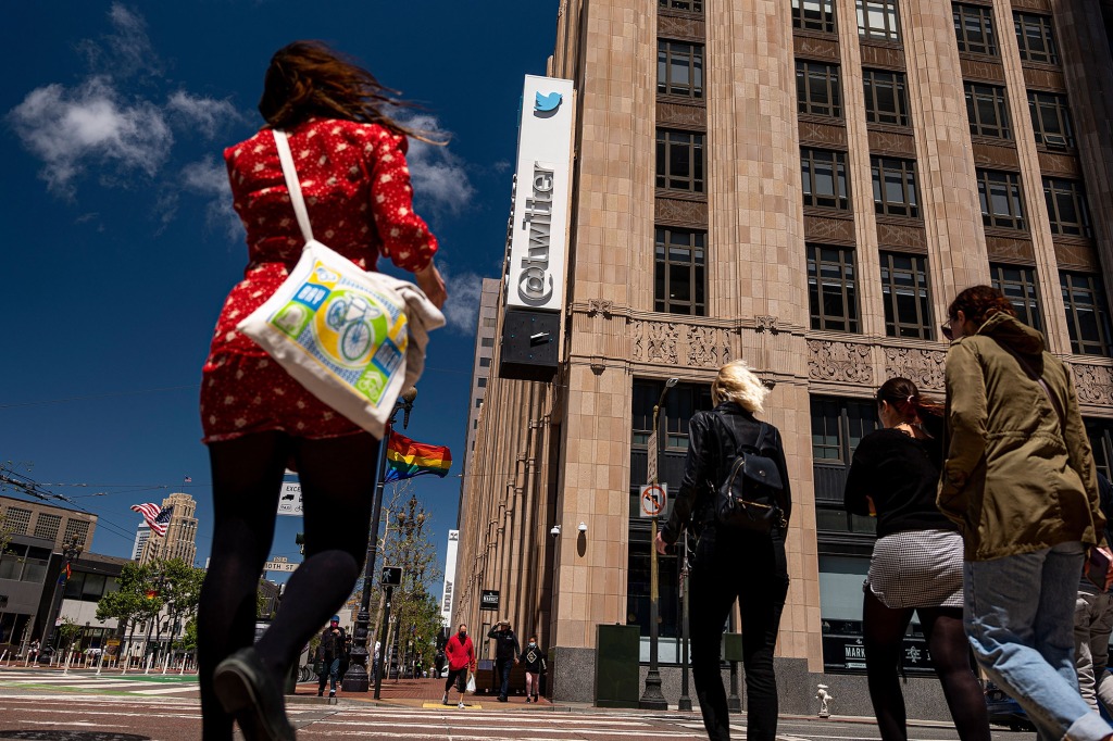 Twitter employees go to work in an office in San Francisco.