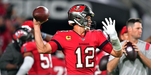 Tom Brady of the Buccaneers warms up before the New Orleans Saints game at Raymond James Stadium on December 19, 2021, in Tampa, Florida.