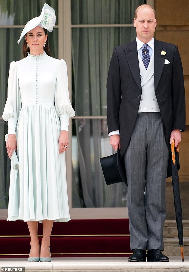The Duchess, 40, hosted the garden party alongside her husband Prince William, 39, and the pair were standing up for the Queen