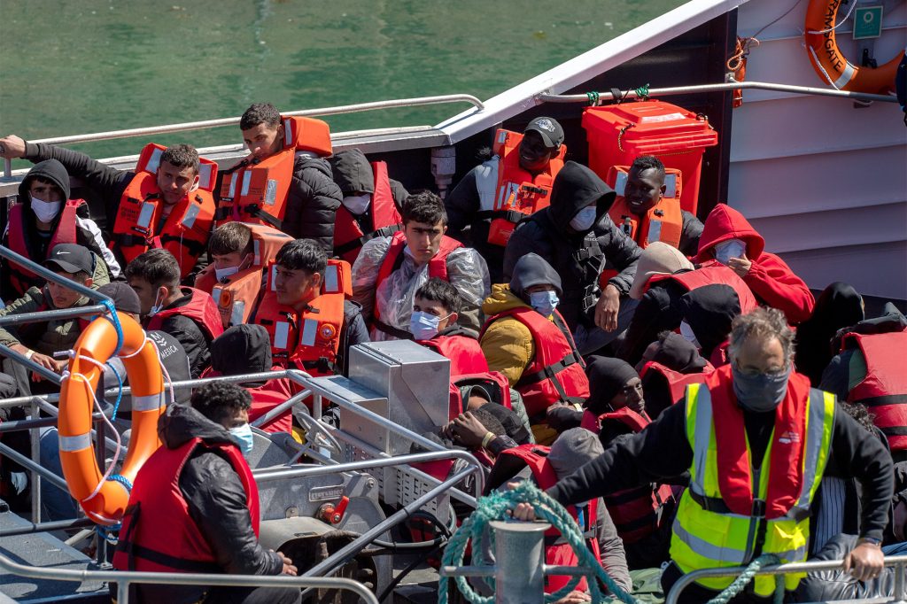UK Border Patrol forces arrested migrants at Dover Harbor, Britain, on May 22, 2022.