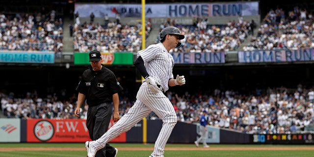 Kyle Higashioka turns third base after scoring a home run against the Chicago Cubs during the third inning at Yankee Stadium on June 12, 2022 in New York City.