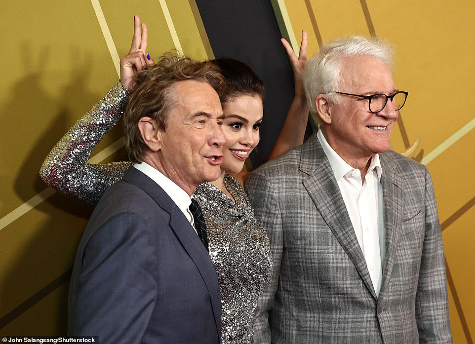 Trio: Selena Gomez gives bunny ears to co-stars Martin Short and Steve Martin at the 'Only Murders in the Building Los Angeles' premiere