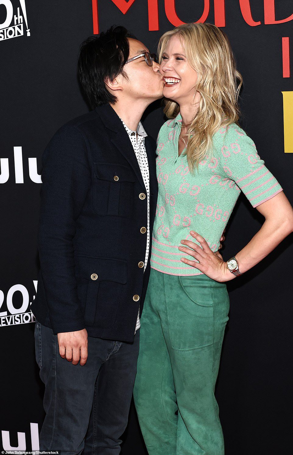 Kiss: Jimmy O. Yang gives his girlfriend Bri Kimmel a kiss at the 'Only Murders in the Building' premiere