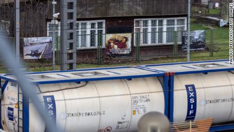 Images from Russia's war in Ukraine are displayed along the railway station as trains pass from Moscow to Kaliningrad, as part of a Lithuanian protest against the invasion.