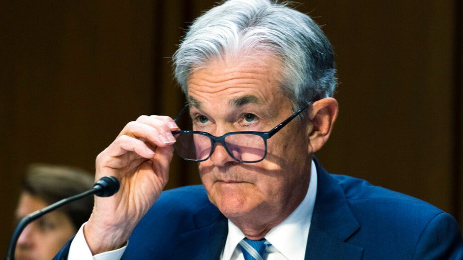 Federal Reserve Jerome Powell wears a w . suit