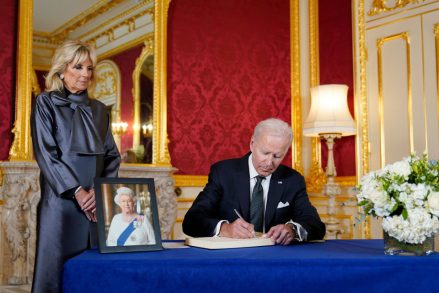 President Joe Biden signs a book of condolence at Lancaster House in London, following the death of Queen Elizabeth II, as First Lady Jill Biden looks on at Royals Biden, London, UK - September 18, 2022