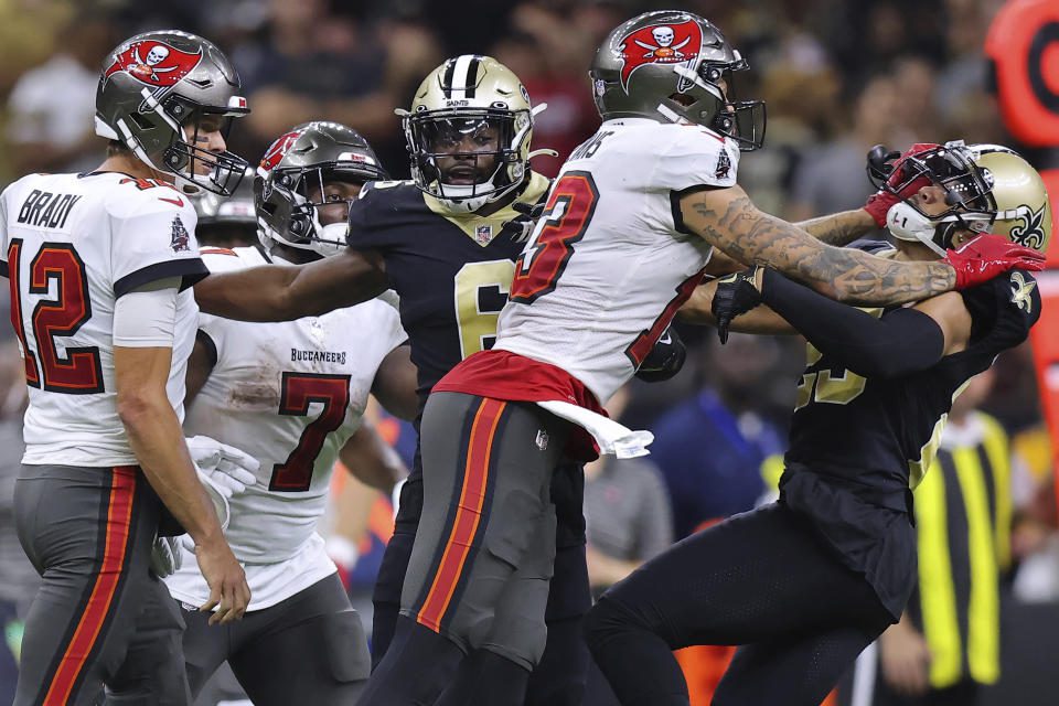 Tampa Bay Buccaneers wide Mike Evans (13) and New Orleans Saints cornerback Marshon Lattimore (23) get into an argument during the second half of an NFL football game, Sunday, September 18, 2021, in New Orleans.  (Associated Press / Jonathan Backman)