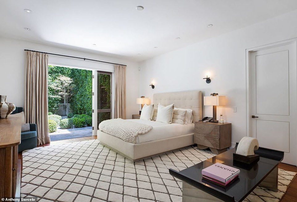 Sweet dreams in this dreamy space: the master bedroom is large and has corner windows overlooking the backyard
