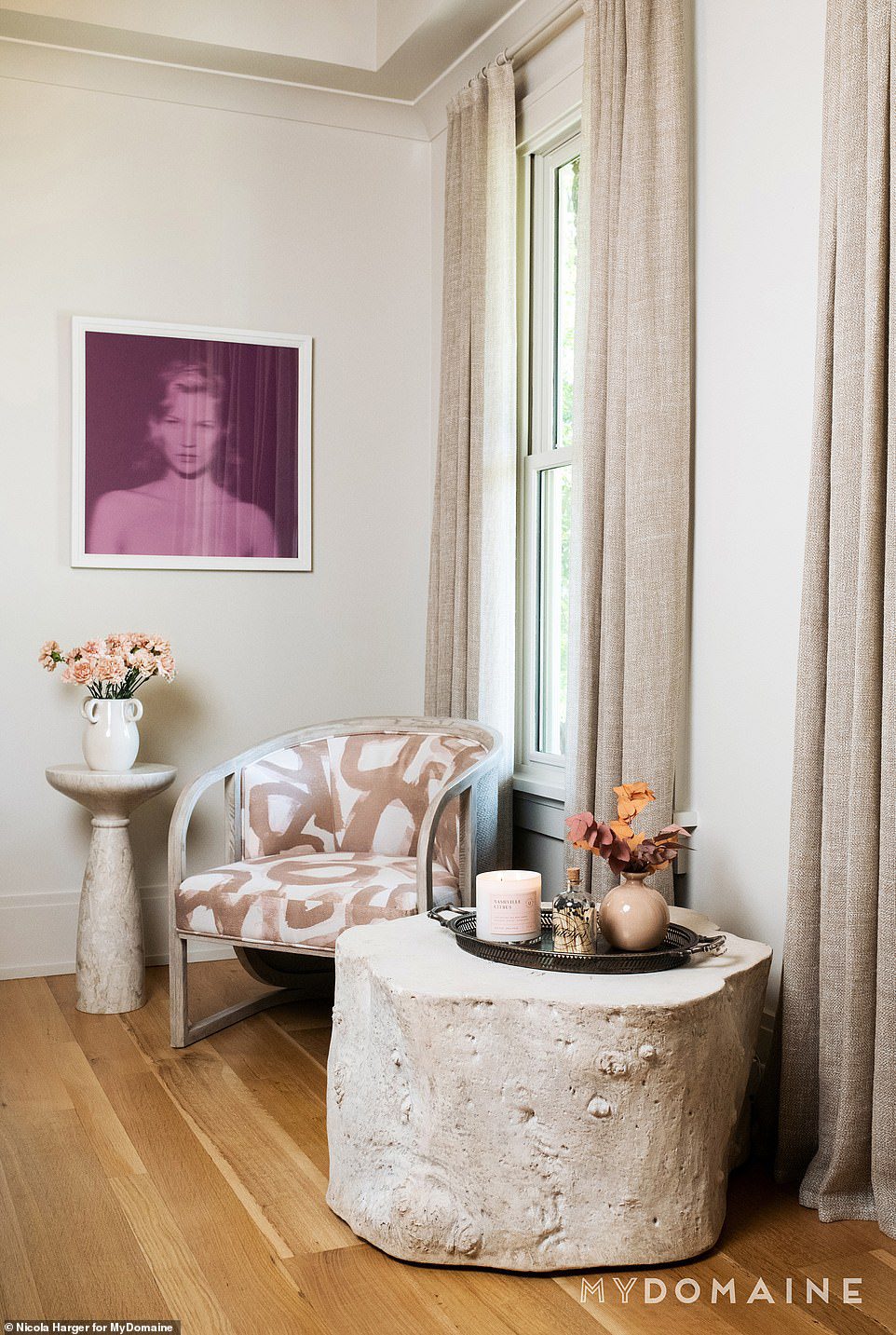 HER OFFICE: Cavallari's office, where the blonde beauty conducts Zoom meetings and business affairs, is a quiet, neutral-toned space complete with a big, pink portrait of her famous idol, supermodel Kate Moss.