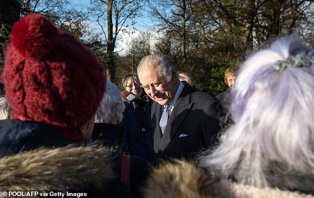 The King was seen speaking with staff and volunteers during a visit to Erddig in Wrexham, North Wales on Friday.